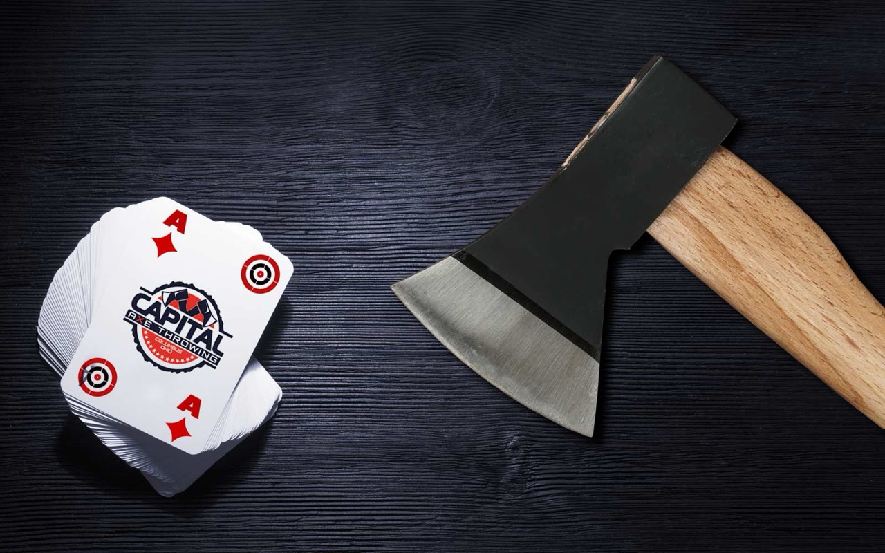 Casino-themed axe throwing setup