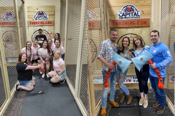 photos of friends and a bachelorette party at an axe throwing venue