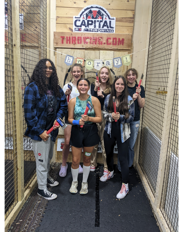 female group celebrating a birthday at Capital Axe Throwing