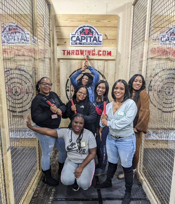 Friends and family axe throwing