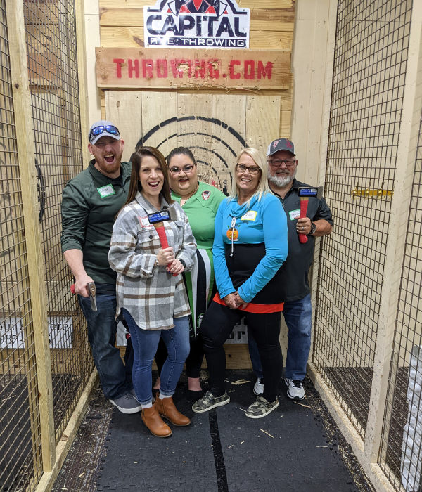 Friends and family axe throwing