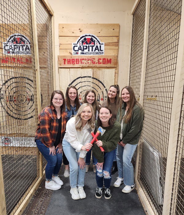 Friends and family axe throwing